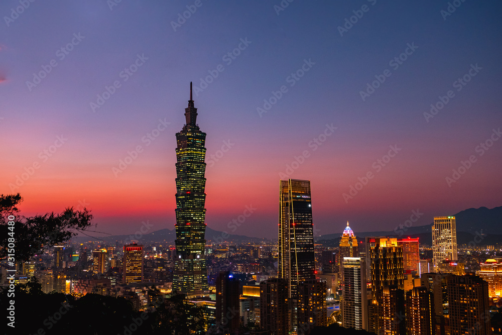 Beautiful dusk cityscape scene, Taipei 101 tower and other buildings. Taiwan.
