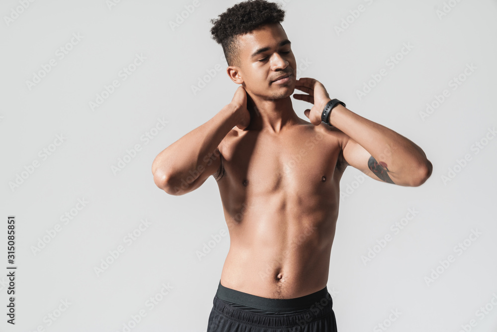 Portrait of african american man doing exercise while working out Portrait of african american man doing exercise while working out