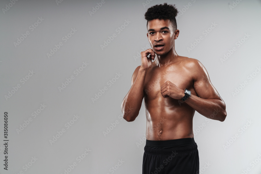 Portrait of african american man doing exercise while working out Portrait of african american man doing exercise while working out