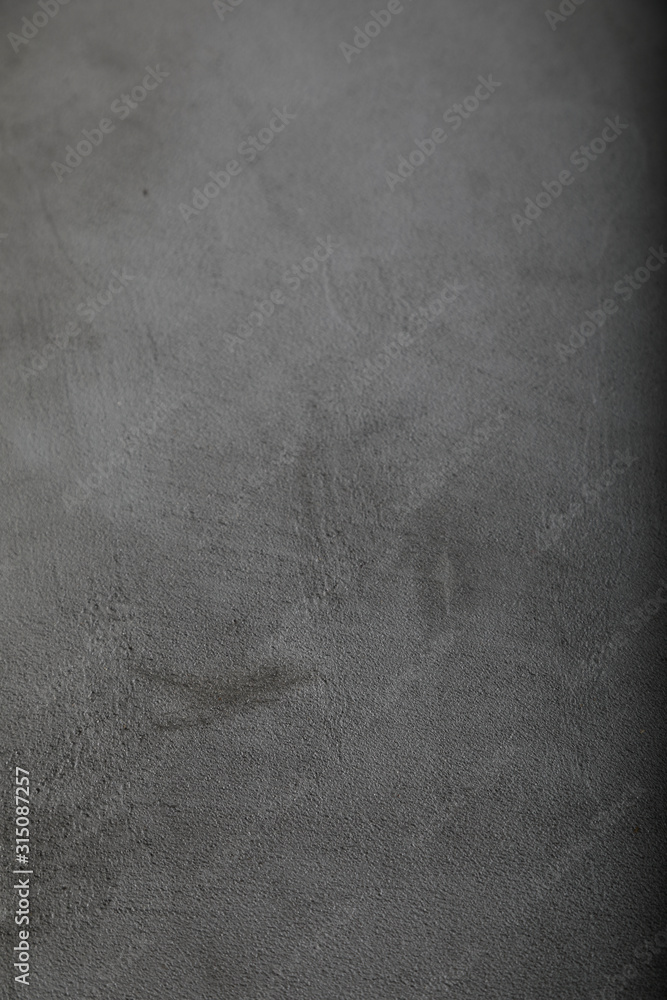 Naklejka premium Gray concrete texture or background. With place for text and image.