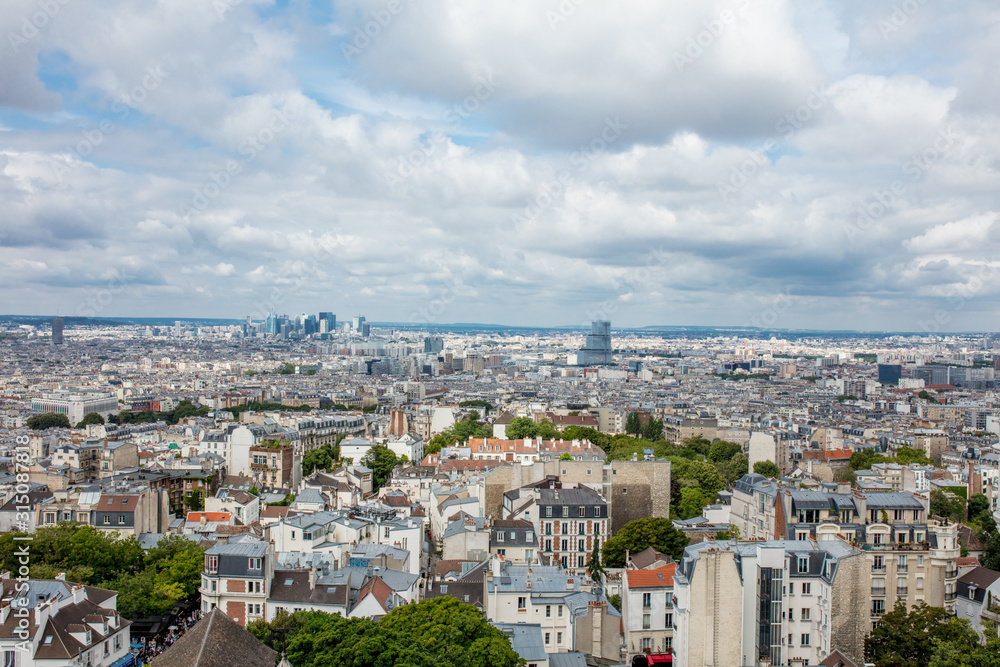 Landscape of Paris with a beautiful view from the top of the European historical quarters of the city