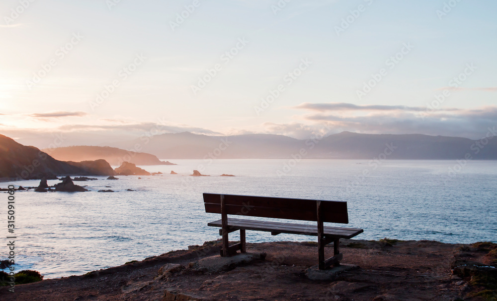 Wooden bench in Loiba cliffs, Ortigueira, Spain.