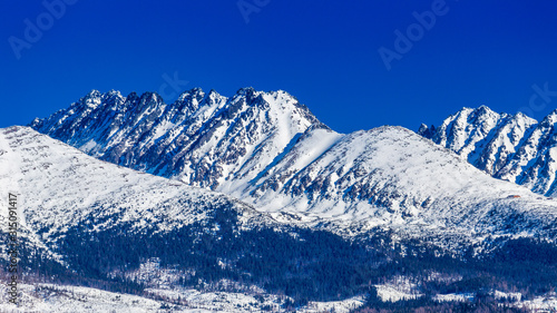 View of the landscape with snowy mountains. The High Tatras National Park, Slovakia, Europe.