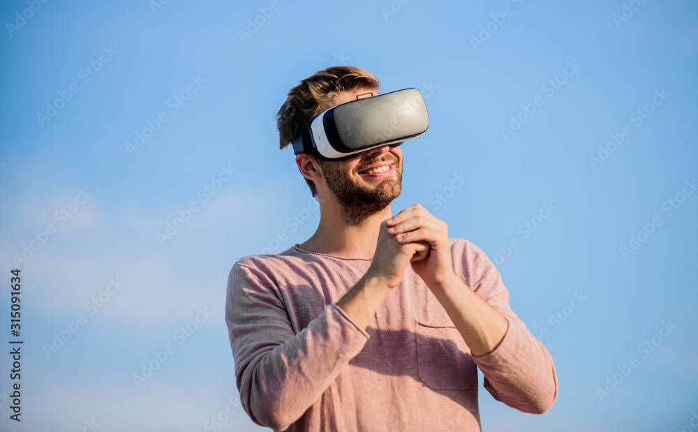 The future. sexy man sky background vr glasses. male reality in digital  world. Use vr headset.