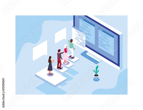 group of people working in front of computer screen