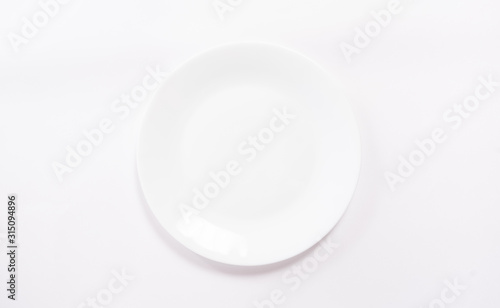 An empty white plate