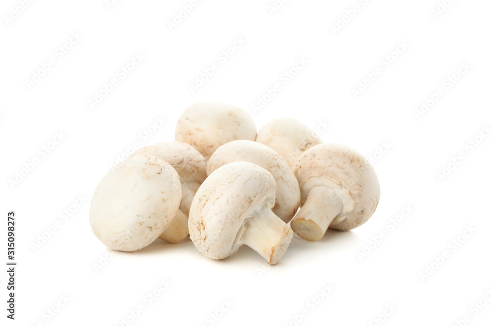 Group of champignon mushrooms isolated on white background