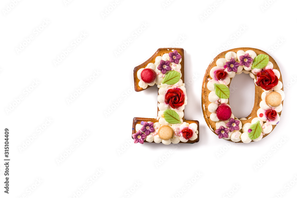 Number ten cake decorated with flowers  and macarons isolated on white background.Copy space	