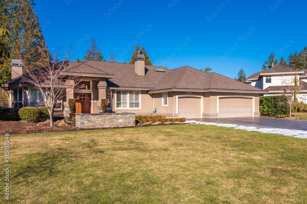 Houses in suburb at Winter in the north America. Luxury houses covered nice snow. Houses in suburb at Winter in the north America. Luxury houses covered nice snow.