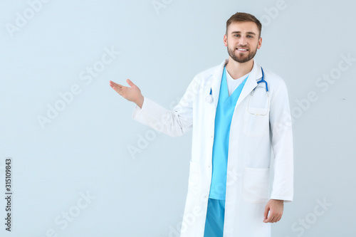 Portrait of male doctor sho...