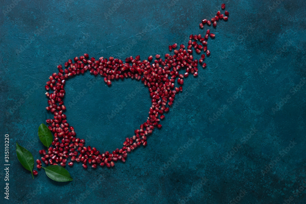Pomegranate on the classik blue background. Top view, close up Pomegranate on the classik blue background. Top view, close up
