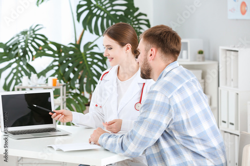 Female doctor working with ...