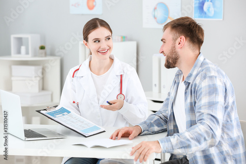 Female doctor working with ...