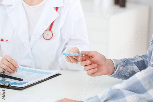 Female doctor working with ...