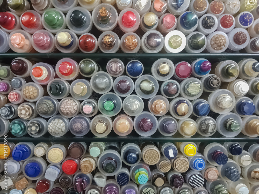 View of various sewing and sewing buttons on vintage retro display in haberdashery View of various sewing and sewing buttons on vintage retro display in haberdashery