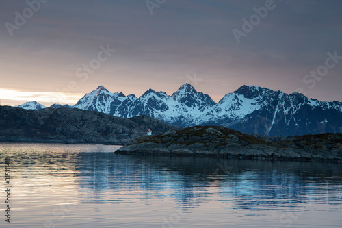Wallpaper Mural Tranquil view of snowy mountains beyond fjord, Maervoll, Lofoten, Norway Torontodigital.ca