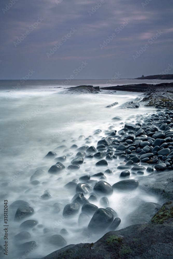 Rocks mystical ocean Cullernose Point Craster Northumberland UK Rocks mystical ocean Cullernose Point Craster Northumberland UK