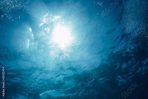 Sun shining over tranquil blue ocean, Vava'u, Tonga, Pacific Ocean