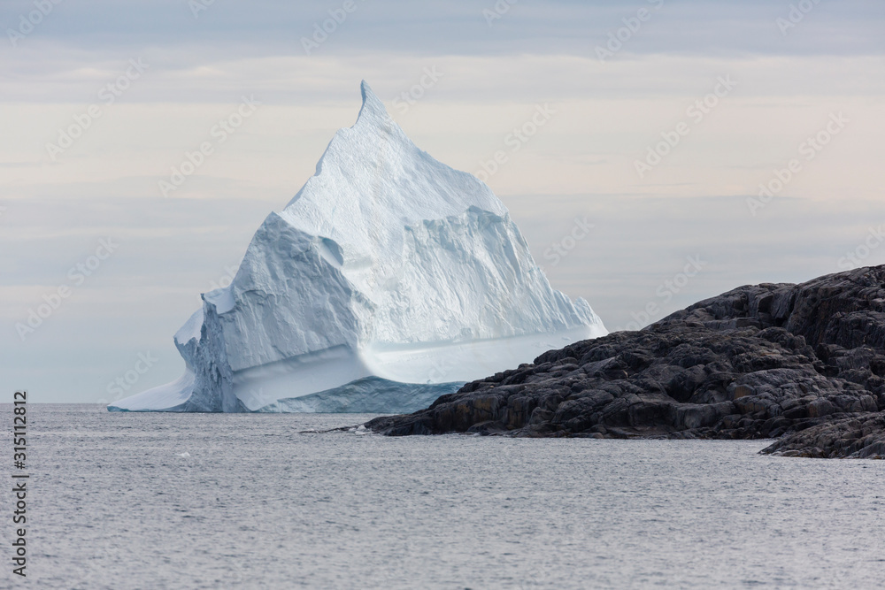 Majestic iceberg formation on Atlantic Ocean Greenland Majestic iceberg formation on Atlantic Ocean Greenland