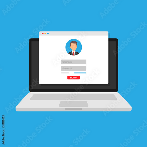 login form, the login page opens in a web browser window on the laptop screen.