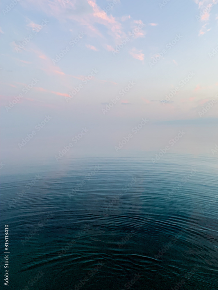 Bright blue sea and sky background