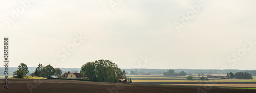 Farm scenery in rural landscape in Linköping, Sweden photo