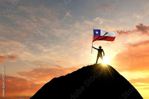 Chile flag being waved at the top of a mountain summit. 3D Rendering