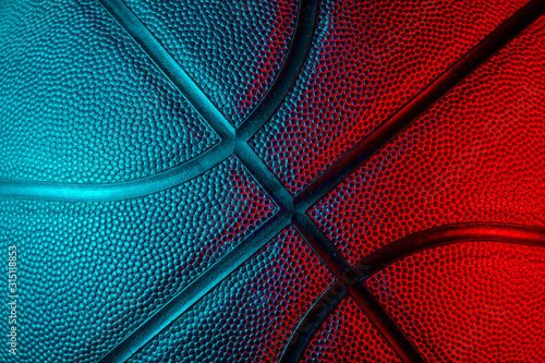 Closeup detail of basketball ball texture background. Neon Banner Art concept © Augustas Cetkauskas