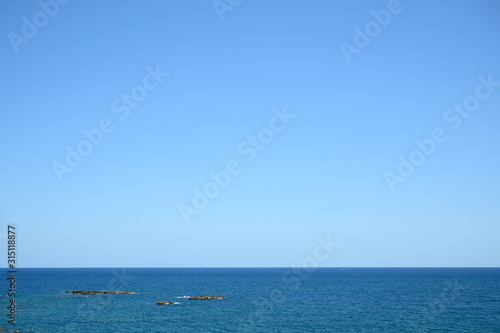 view of calm sea and sky from Ortigia Syracuse © rosario scalia