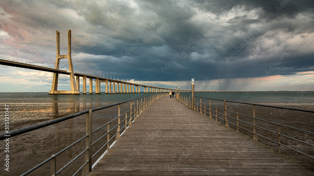 Vasco da Gama Bridge at sunset in Lisbon, Portugal