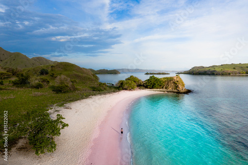 walking on the pink sand beach. Amazing dreamy beach. Lombok, Indonesia, Komodo, Australia
