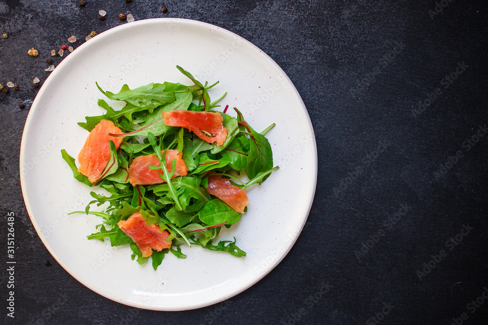 healthy salad leaves mix, salmon or tuna (delicious snack) menu concept. food background. top view. copy space