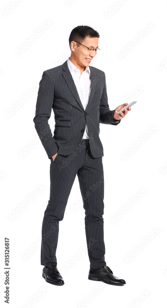 Portrait of Asian businessman with mobile phone on white background Portrait of Asian businessman with mobile phone on white background