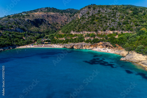 Aerial drone bird's eye view of of Mega Drafi Beach with turquoise sea in Parga area, Ionian sea, Epirus, Greece © ververidis