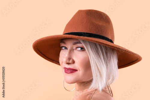 Fashionable mature woman on...