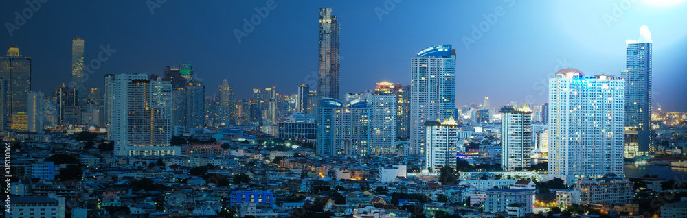 Fototapeta premium panorama city night view banner for web design on blue background color, moon light at top right of pic