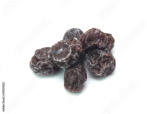 Dried  plums isolated on white background