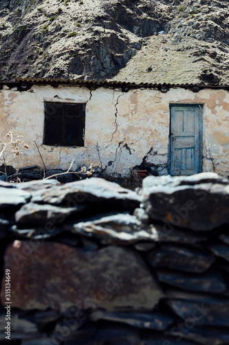 Old mountain house in Gergeti village near peak Kazbegi in Georgia