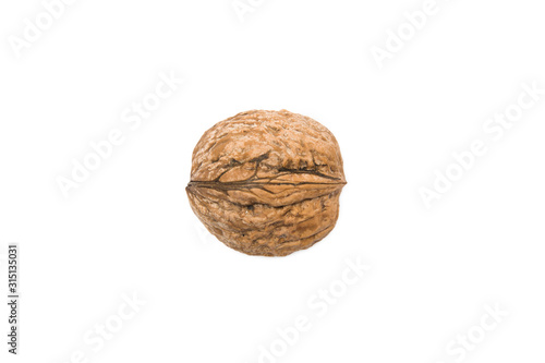 Single walnut isolated on white background