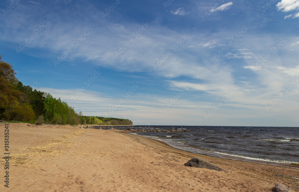 Gulf of Finland. Russia. View from the shore of the Bay and the beautiful sky.