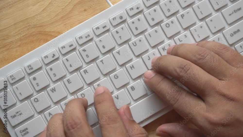 man hand typing on keyboard man hand typing on keyboard