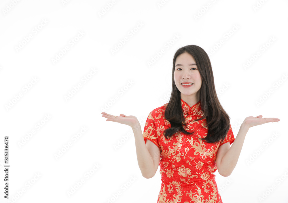 the asian young pretty little girl wearing Chinese dress on isolated white background copyspace the asian young pretty little girl wearing Chinese dress on isolated white background copyspace