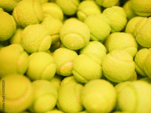 Sweets in the form of tennis balls. Multi-colored sweets. close-up. Children's sweets. The cause of childhood caries. photo