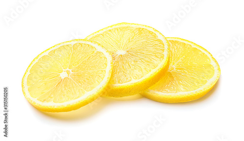 Ripe cut lemon on white background
