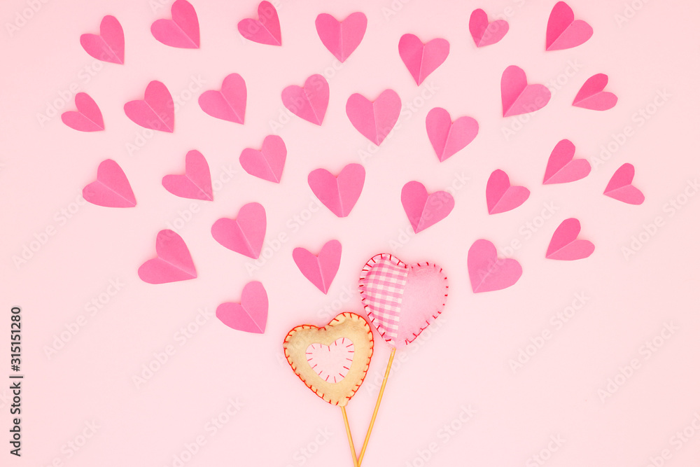 Pink pastel trendy decoration with cute hearts on pink background 
