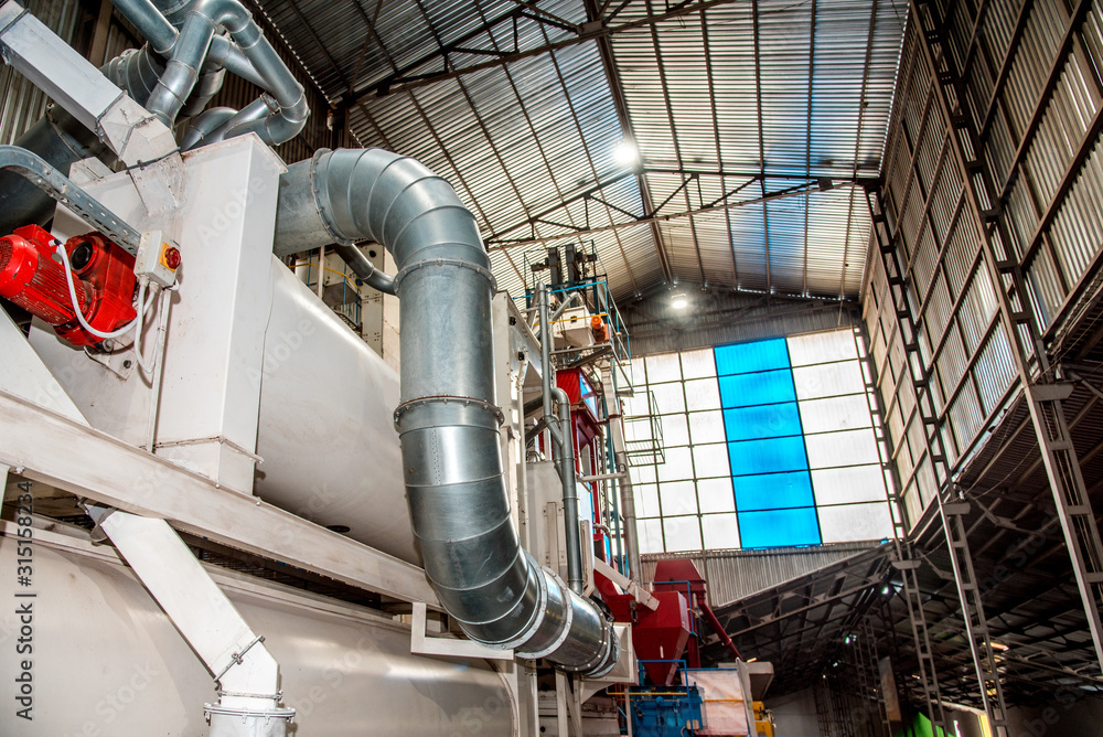 Agroindustrial view with internal structures and equipment of grain elevator.