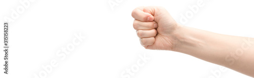 panoramic shot of woman showing fist isolated on white