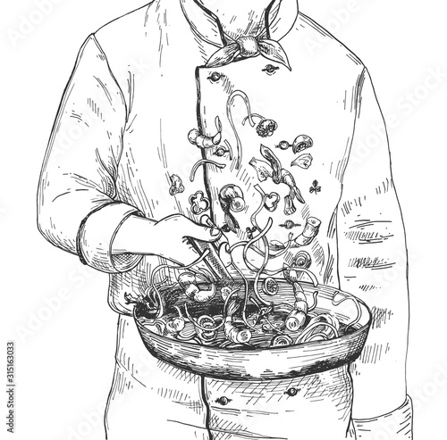 Cropped view chef flips dish on pan