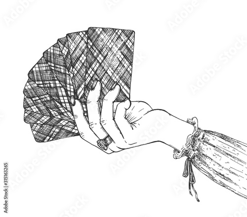 Woman hand with playing cards fan