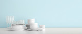 Set of clean dishware on table with space for text